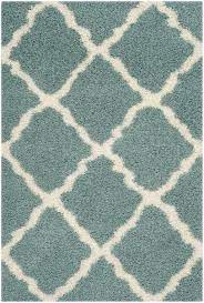If at all you're planning on picking a blue patterned rug for your home or office, you may find it really hard to. Rug Sgd257c Dallas Shag Area Rugs By Safavieh