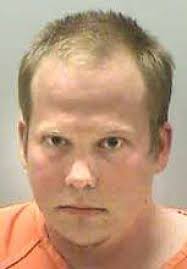 Crookston man accused of stabbing father 2 dozen times