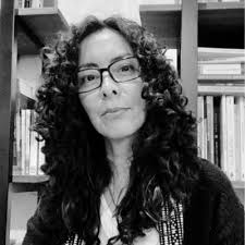 The con artist Anna (Delvey) Sorokin photographed by Gillian Laub in her  living room in New York City.