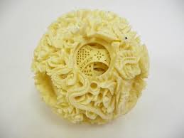 A ball of jade being carved into a multi layered puzzle. Inspiration From Chinese Puzzle Balls Xueningzhang