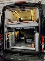 Camper Van With Hydraulic Bed Lift Ford Transit Camper Camper Van Conversion Diy Camper Van