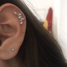 floral cz earring crawler stack lobe piercing helix cz etsy in 2021 lobe piercing inner conch piercing earings piercings