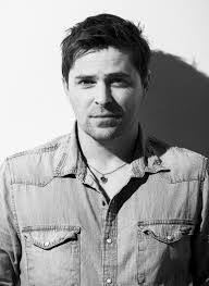 Watching Pascale Hutton in "Arctic Air." She was the hot Lantean first  officer