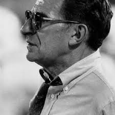 Owen Friend Bends Down For The Catch. 1956 Photograph by Barney Stein