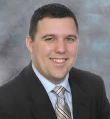 Brian Wyman headshot gray background