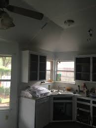kitchen sink with a sloped ceiling