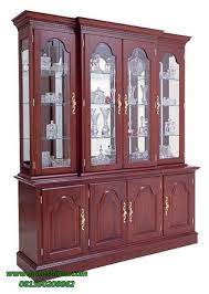 Harga yang kami berikan tergolong murah jika anda bandingkan dengan kualitas yang kami berikan. Lemari Hias Ruang Tamu Jati Kaca Putushima Furniture