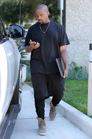 Kanye west hit the streets of la in a balaclava mask covering his entire face. The Kanye West Look Book Kanye West Style Kanye West Outfits Mens Fashion Streetwear