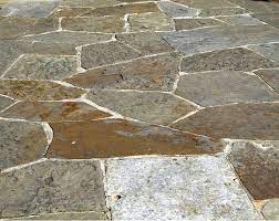 We like the look of a stamped patio and our builder only installs a basic concrete slab patio and it is pretty costly. Flagstone Vs Stamped Concrete Vs Patio Blocks Vs Wood Patios Blackwell Masonry Ltd