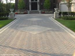 Nicely melds with adjoining design on both sides.: Diamond Shape In Brick Brick Paving Driveway Paving Ideas Driveway Design