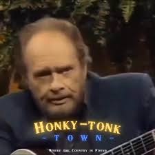 Merle playing the fiddle in the 1970s