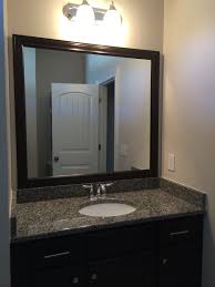 Diy Framed Mirror We Used Double Sided Tape To Mount Frame To Existing Plate Glass Mirror We Built The Fram Decorating Bathroom Diy Bathroom Mirror Frame Diy