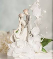Curious about wedding cake toppers? Shop Justcaketoppers Com