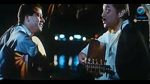 في فيلم الكيت كات يحكي الفنان المخضرم لـ بوابة الأهرام عن مشهدين يبقيان دائمًا في ذاكرته خلال تصوير هذا العمل الذي جمعه بالنجم الكبير، ويقول: Ø±ÙˆØªØ§Ù†Ø§ Ø³ÙŠÙ†Ù…Ø§ Ø£Ø­Ù„Ù‰ Ø£ØºÙ†ÙŠØ© Ù…Ù† ÙÙŠÙ„Ù… Ø§Ù„ÙƒÙŠØª ÙƒØ§Øª Ù„Ù„Ø³Ø§Ø­Ø± Ù…Ø­Ù…ÙˆØ¯ Ø¹Ø¨Ø¯Ø§Ù„Ø¹Ø²ÙŠØ² Youtube