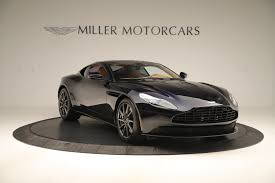 Image result for Marron Black 2017 Aston Martin