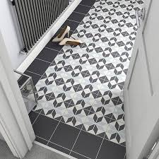 The dijon tumbled limestone floor tiles add a truly classical english feel to a kitchen or bathroom. Hydrolic Black White Matt Star Porcelain Wall Floor Tile Pack Of 25 L 200mm W 200mm Diy At B Q