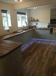 See more ideas about worktop offcuts, work tops, kitchen worktop. Grey Gloss Handless Kitchen With Oak Worktop Industrial Chic Grey Gloss Kitchen Kitchen Cabinets Gloss Kitchen Cabinets