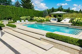 Growing a mix of foliage plants and flowering plants is smart: 11 Inground Pool Landscaping Ideas