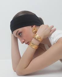 Issa Vibe ✌️ Shop the Medallion Earrings & Kingsuki Bangles at  www.shopanatina.com . . . #shippingworldwide #anatina #goldplatedjewelry  #statementjewelry