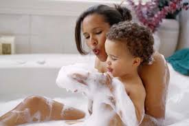 When should a parent stop bathing with their child? | MadeForMums