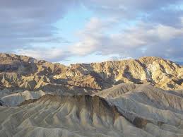 The overlook stands at the upper east end of a badlands terrain full of impressive. File Zabriskie Point At Sunrise In Death Valley Np Jpg Wikipedia