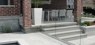 Outdoor stair railings are one of the first things your visitors see. Montreal Outdoor Living Glass Railing Fence