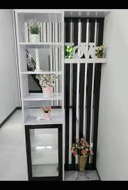 Bahkan lemari sekat ruangan ini dapat digunakan sebagai bufet tv, yaitu tempat untuk meletakan pesawat televisi yang sangat cantik dan pas. Sekat Ruangan Minimalis Modern 2 Muka Rak Atau Lemari Rumah Minimalis