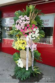 Quezon, it was established during the american commonwealth period and from. Standing Arrangement Of Gerberas Assorted Mums Sympathy Funeral Flowers Flower Patch Online Flower Delivery Phillippines