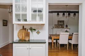 white kitchen cabinet with glass doors