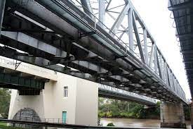 The indooroopilly railway bridge is a railway bridge of steel truss design which crosses the brisbane river, queensland, australia. File Indooroopilly Bridge Jpg Wikipedia