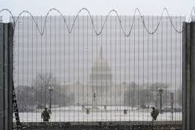 Workers build a fence around the u.s. Capitol Building Fence Is Blocking D C Laws From Approval Pbs Newshour