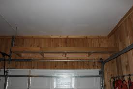 Reclaim your garage with this easy weekend woodworking project. Shelves Over The Garage Door The Cavender Diary