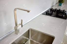 We offer high quality, 16 gauge sinks for kitchens and bars with brushed bowls and polished rims. Modern Design Chrome Water Tap Over Stainless Steel Kitchen Sink Stock Photo Picture And Royalty Free Image Image 143732911