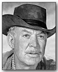 Ward Bond [1903-1960] specialized in the tough, crusty character trying to  hide a caring heart of gold. His final success was starring in the TV  series "Wagon Train." Ward Bond died on
