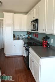 Painted Kitchen Cabinets With Benjamin Moore Simply White Painting Kitchen Cabinets White White Kitchen Cabinets Diy Painting Kitchen Cabinets