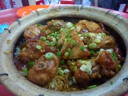 Cut chicken into smaller pieces. Penang Food For Thought Wei Ji Claypot Chicken Rice