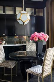 Black And Gold Dining Room Chairs Gold And Black Dining Room With Robert Abbey Mary Mcdonald Pythagoras Pendant Contemporary Dining Roo Black Dining Room Gold Dining Room Modern Dining Room