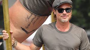 Angelina jolie dcmg is an american actress, filmmaker, and humanitarian. Brad Pitt Seemingly Unveils Mysterious New Tattoo Next To His Angelina Jolie Ink Youtube