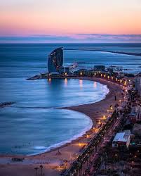 La barceloneta is a triangular coastal area in eastern barcelona. La Barceloneta Beach And W Hotel Barcelona Barcelona Noche Fotos De Barcelona Paisajes De Espana