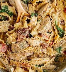 This recipe of chicken and roasted tomato farfalle is an easy and light meal that is quick and versatile. Tuscan Chicken Pasta The Cozy Cook
