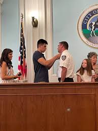 Captain Steve Himes being sworn in as...