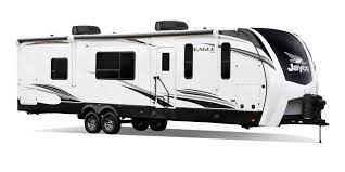 Small travel trailer with theater seating. 2021 Eagle Luxury Travel Trailer
