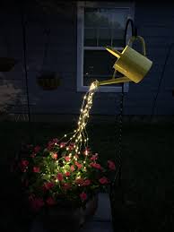 Watering Can Lights Over Flowers Can Lights Outdoor Garden Lights