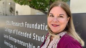 Deanna Mackey, New KPBS Boss, to Make $290,000 —10% More Than Male Ex-GM