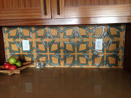 Kitchen backsplash with decorative mural using angeles talavera mexican tile. Kitchen Design Mexican Tile Designs