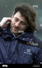 Assistant Italian rugby union coach Masimo Giovanelli directs his team,  during a training session in Barnes, London, ahead of their Six Nations  Championship match against England at Twickenham Stock Photo