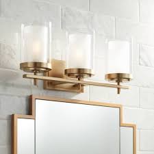 This wall mount's petite design mounts seamlessly to the wall without a chain or visible wires. Brass Bathroom Lighting Vanity Lights Lamps Plus
