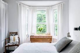 The master bedroom has a commanding view over hollywood and an open bath expands the feeling of the space. Bedroom Windows Buying Guide