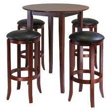 Under the tabletop is an extra storage 5pc Fiona Counter Height Dining Set With 4 Swivel Stools Wood Antique Walnut Winsome Target
