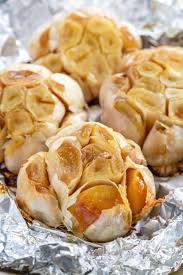 And when you remove it, the garlic will look like this. How To Roast Garlic Oven Stovetop Jessica Gavin